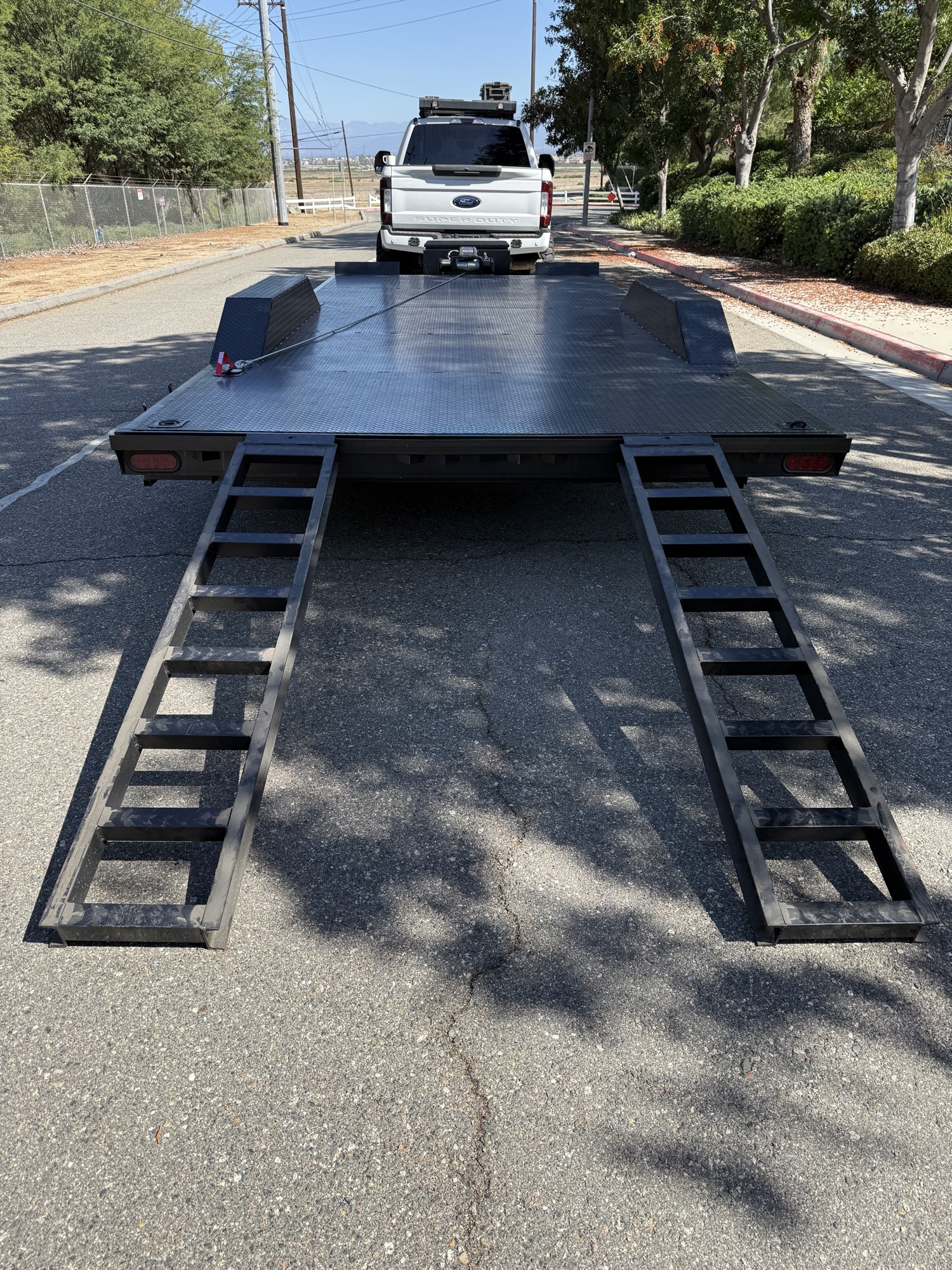 Trailer with loading ramps down